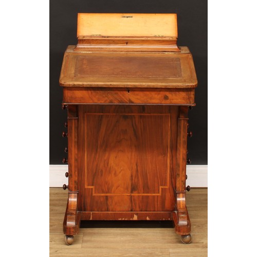 302 - A Victorian walnut Davenport desk, hinged rectangular superstructure with inscribed brass plaque enc... 