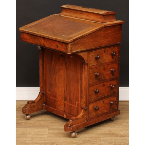 302 - A Victorian walnut Davenport desk, hinged rectangular superstructure with inscribed brass plaque enc... 