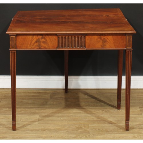 304 - A mahogany tea table, hinged crossbanded rectangular top above a deep frieze centred by a nulled tab... 