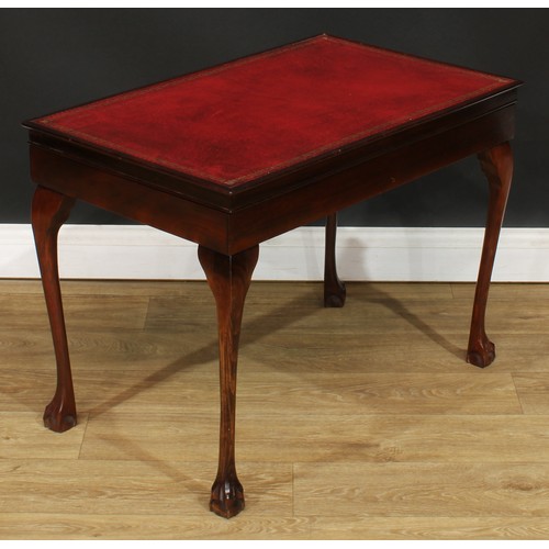 402 - A mahogany canteen table, inset tooled and gilt top enclosing a King’s pattern service, by Barnett &... 