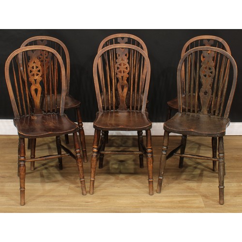 416 - Six Windsor wheelback dining chairs, 91cm high, 37cm wide, the seat 34cm deep (6)