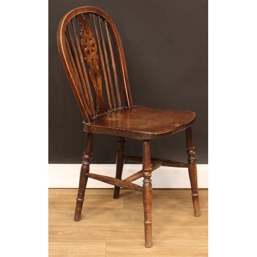 416 - Six Windsor wheelback dining chairs, 91cm high, 37cm wide, the seat 34cm deep (6)