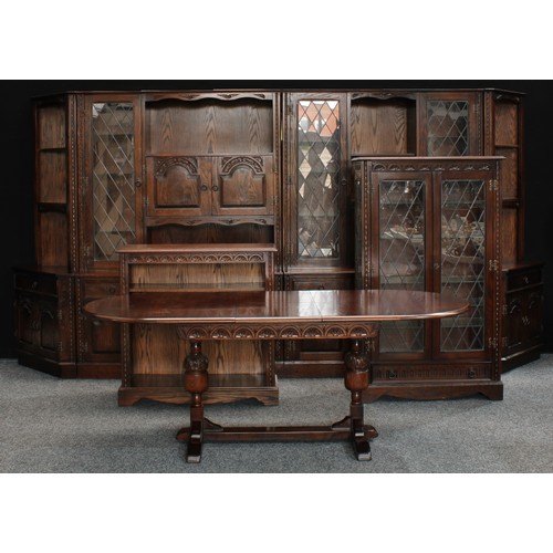 690 - A substantial Jaycee display cabinet or side cabinet, 200cm high, 398cm wide, 56cm deep; a similar g... 