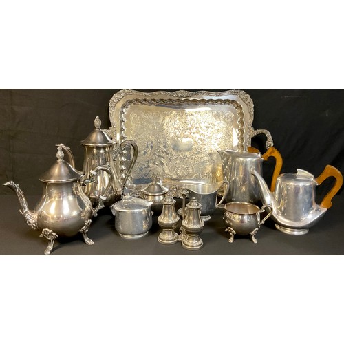 692 - A Piquot Ware four piece tea service; an EPNS associated four piece tea tea service on tray; an EP c... 