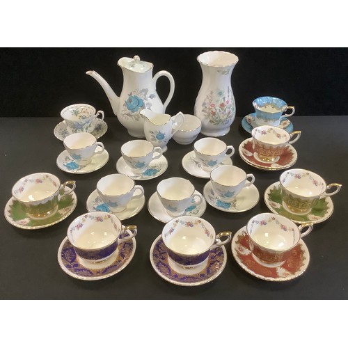 48 - A Paragon tea service, for six, each in an alternate colour, picked out in gilt, printed  marks;  an... 