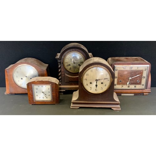 79 - A late 19th century oak mantel clock, Roman numerals, twin winding holes, domed case, turned pilaste... 