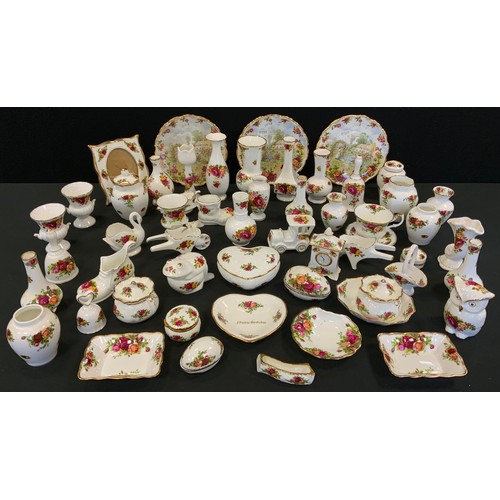 104 - A Royal Albert Old Country Roses trinket dishes, vases, animal models, bell, etc