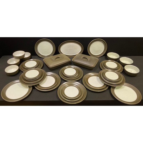 114 - A Denby dinner service, for twelve, brown glazed, comprising two tureens, plates, bowls, side plates... 