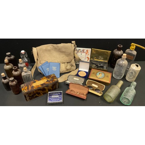 125 - World War II canvas bag;  old bottles;  commemorative coins;  etc