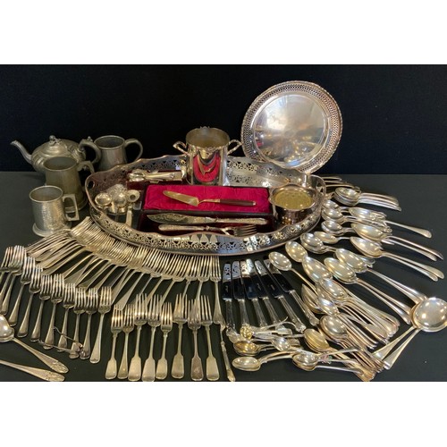 128 - A large  oval silver plated galleried tray, 61cm x 40cm;  cased and loose flatware, perter cups, tea... 