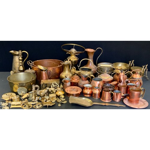 132 - Brass and Copper - jugs, candlestick;  jam pan;  vases;  models;  horse brasses;   etc