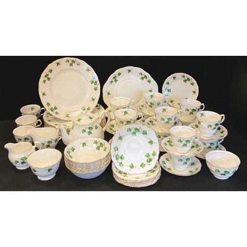 158 - A Colclough Ivy pattern dinner and tea set, dinner plates, bowls, side plates, tea pot, cups, saucer... 