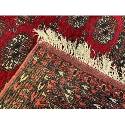 165 - A Turkman style hand-knotted Persian rug / carpet,  the central field with all-over medallion design... 