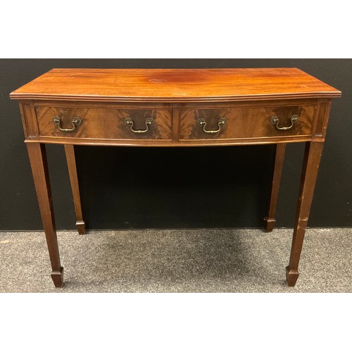 173 - A 19th century mahogany bow front side table, fitted with two drawers, 84cm high,  107cm wide, c.182... 