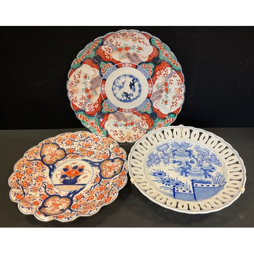 186 - A 19th century Japanese imari shaped circular charger, 35cm diameter; another;  blue and white plate... 