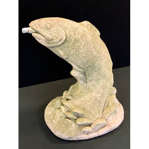 210 - A reconstituted stone garden fountain head water feature, as a Leaping Salmon, 38cm high, 29cm deep