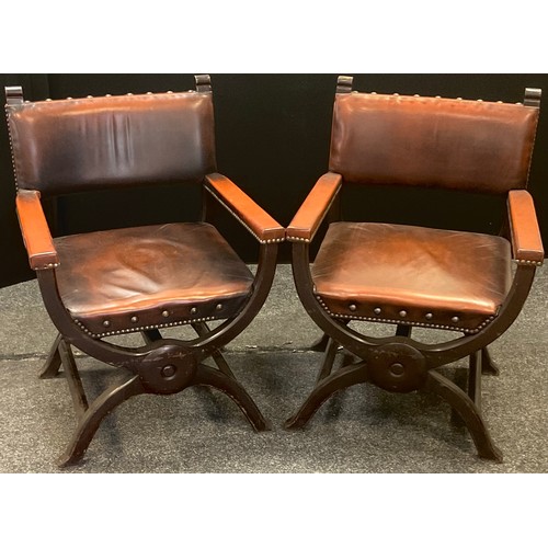 221 - A pair of Italian Renaissance Revival Dantesca or Savonarola X-frame chairs, stuffed-over upholstery... 