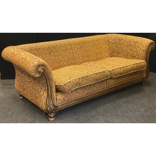 279 - A large scroll arm three seater sofa, 86cm high, 250cm wide, 110cm deep