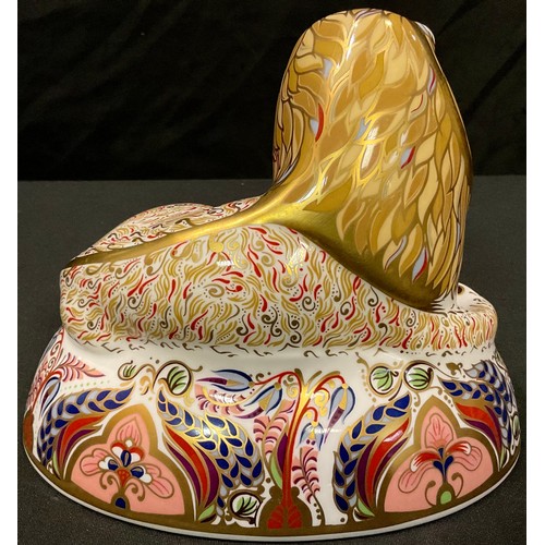 44 - A Royal Crown Derby paperweight, Lion, gold stopper, 15cm high, printed mark in red, boxed