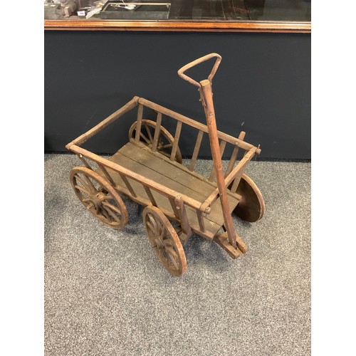 291 - A late 19th/early 20th century hand cart, hinged handle, metal bound wheels, 64cm high, 64cm wide, 1... 