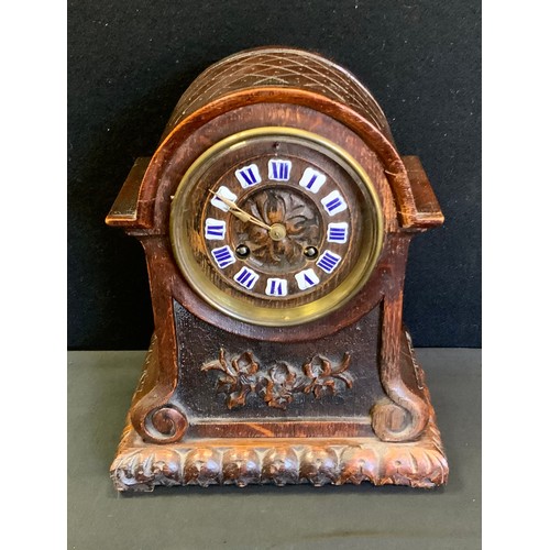 301 - A late 19th century oak mantel clock, blue enamelled Roman numerals, c.1890