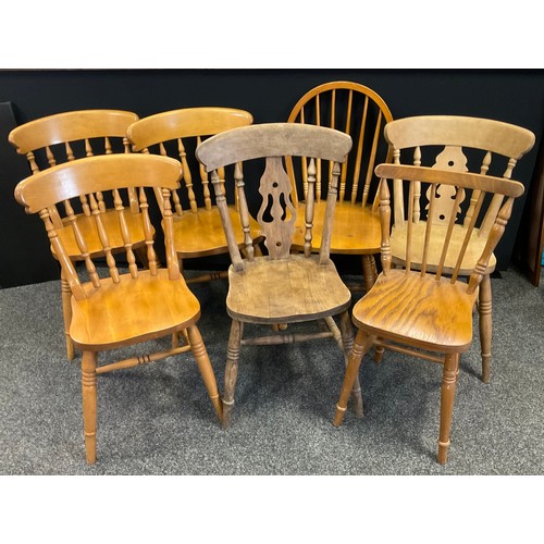 309 - A set of three pine dining chairs, turned backs, others spindle back etc (7)