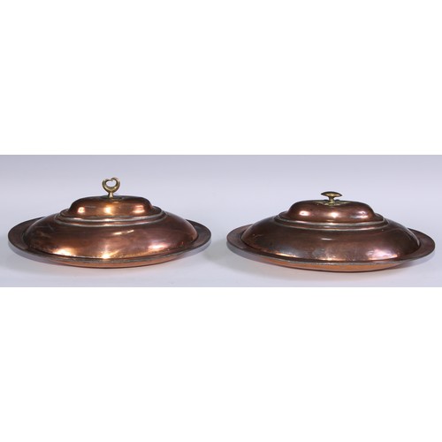 62 - A pair of Middle Eastern copper oval entree dishes and covers, 31cm, wide, marked to interiors, 19th... 