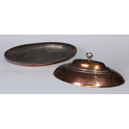 62 - A pair of Middle Eastern copper oval entree dishes and covers, 31cm, wide, marked to interiors, 19th... 