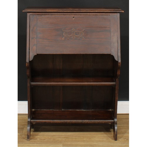 654 - An early 20th century oak bookcase bureau, 102cm high, 76cm wide, 31cm deep, c.1930; an early 20th c... 