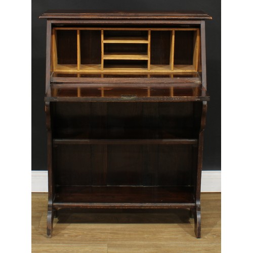 654 - An early 20th century oak bookcase bureau, 102cm high, 76cm wide, 31cm deep, c.1930; an early 20th c... 