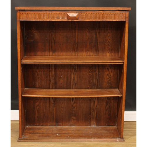 656 - An oak chest of three long drawers, 79.5cm high, 91.5cm wide, 53cm deep; an oak open bookcase, 129cm... 