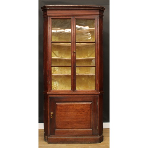 658 - A George III oak floor-standing corner display cabinet, 223cm high, 106cm wide, 49cm deep, early 19t... 