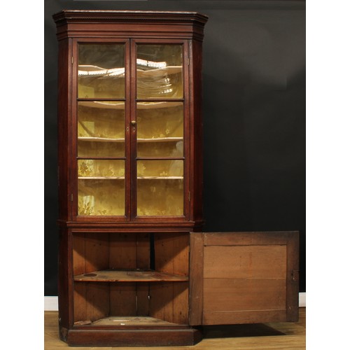 658 - A George III oak floor-standing corner display cabinet, 223cm high, 106cm wide, 49cm deep, early 19t... 