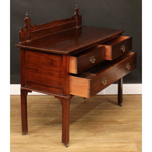 670 - A Chippendale Revival mahogany chest, shaped superstructure, oversailing top above two short and one... 