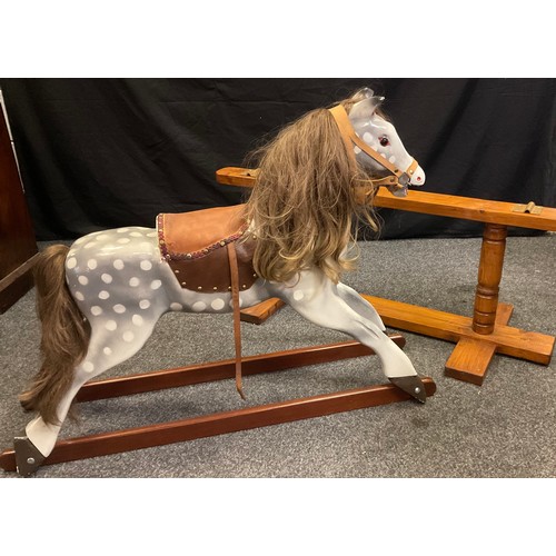 50 - A 20th century painted dapple grey rocking horse (lacking its support / swing brackets), 95cm tall x... 