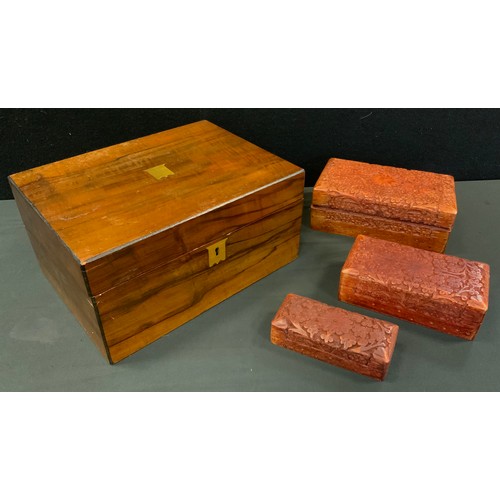 56 - A Victorian mahogany folding writing box, brass shield escutcheon, 30cm wide, c.1860;  other boxes