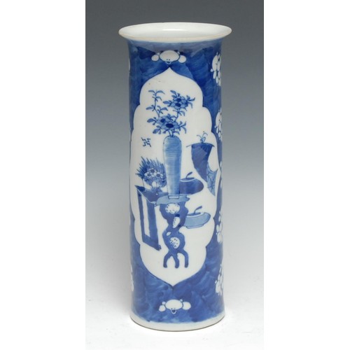 67 - A Chinese  cylindrical sleeve vase, painted in underglaze blue with vase on a stand, the ground with... 