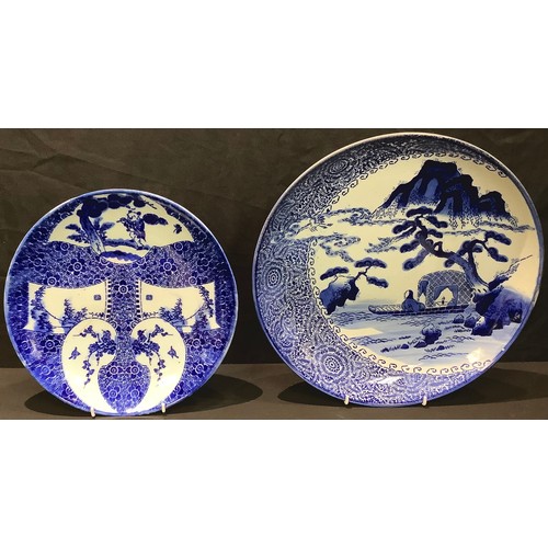 68 - An early 20th century Japanese blue and white charger, 29cm diameter; another similar, 35.5cm diamet... 