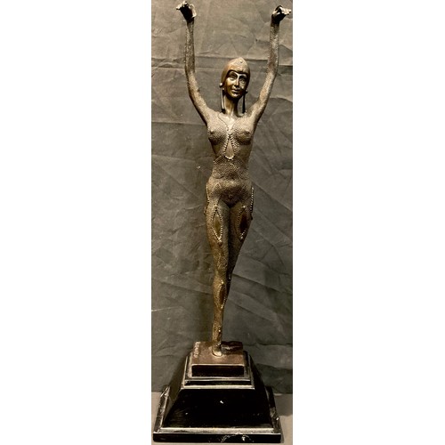 72 - After Agathon Leonard, an Art Deco style dancing girl, her hands raised, signed in the maquette, ste... 