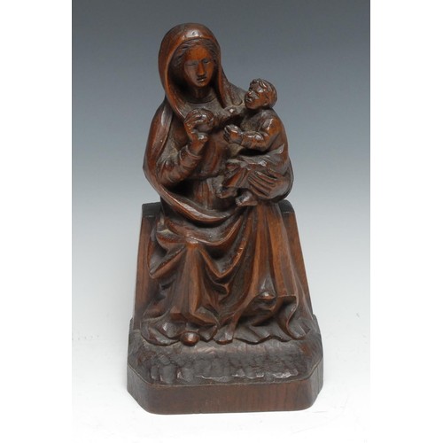 77 - A North European oak carving, Madonna and Child, 29cm high, 19th century