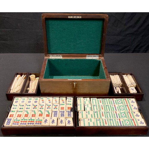 79 - A Chinese Mahjong set, bone and bamboo pieces in fitted hardwood box, hinged cover, 24.5cm wide, ear... 