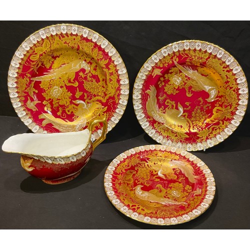 85 - A set of three Royal Crown Derby Red Aves pattern graduating plates, heraldic border; a similar sauc... 