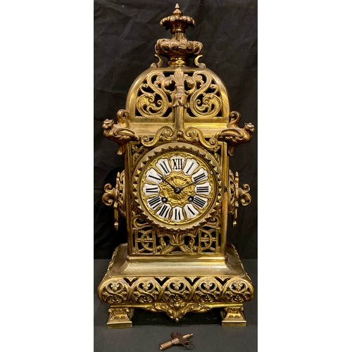 95 - A French gilt bronze mantel clock, Roman numerals, key and pendulum, 48cm high