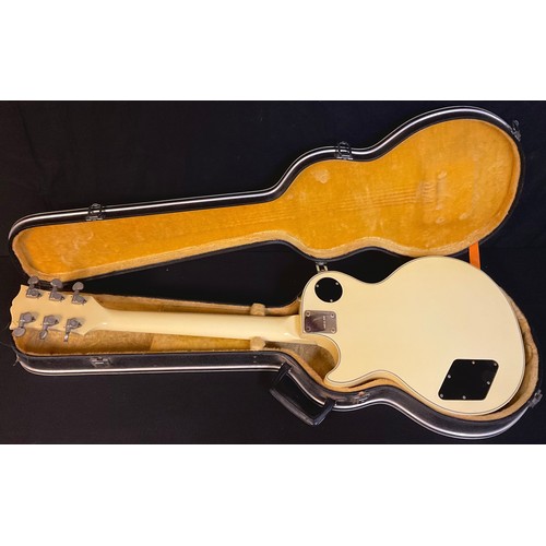 100 - Musical Instrument - a Custom CSL electric guitar, cased en suite, 20th century