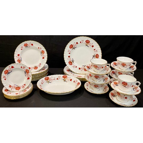 84 - A Royal Crown Derby Bali pattern part dinner and tea service comprising dinner plates, dessert plate... 