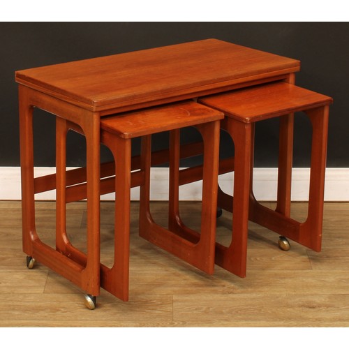 103 - Mid-century Design - a retro McIntosh Triform teak nest of tables, the largest 60cm high, 74.5cm wid... 