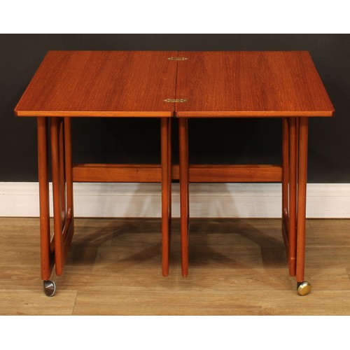 103 - Mid-century Design - a retro McIntosh Triform teak nest of tables, the largest 60cm high, 74.5cm wid... 