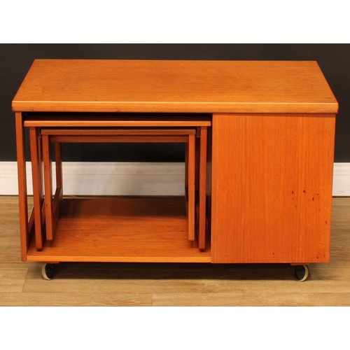 105 - Mid-century Design - a retro McIntosh Tristor teak coffee table, hinged top above a graduated pair o... 