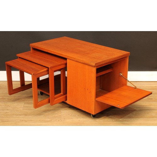 105 - Mid-century Design - a retro McIntosh Tristor teak coffee table, hinged top above a graduated pair o... 