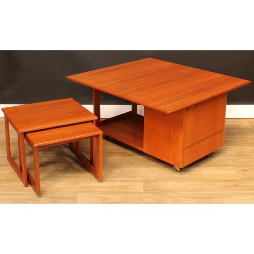 105 - Mid-century Design - a retro McIntosh Tristor teak coffee table, hinged top above a graduated pair o... 